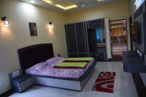 Letto o letti in una camera di Shree Ramkrishna Anandvan