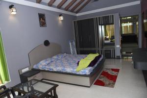 Letto o letti in una camera di Shree Ramkrishna Anandvan