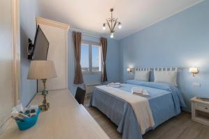 Postel nebo postele na pokoji v ubytování Podere Abbazia b&b + 37 fotografií