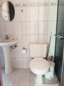 Ванная комната в Pousada Morro Bello