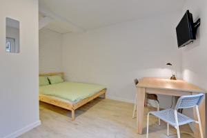 TV a/nebo společenská místnost v ubytování Pokoje Gościnne Piątka