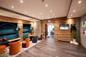 TV a/nebo společenská místnost v ubytování Hotel Hochheide