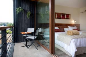 Postel nebo postele na pokoji v ubytování Maki Hotel