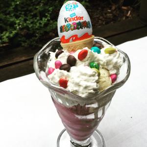 an ice cream sundae with a birthday egg on top of it at Centrum25 in Olsztyn