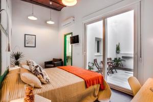Postel nebo postele na pokoji v ubytování Casa Palacio El Condestable de Sevilla + 37 fotografií