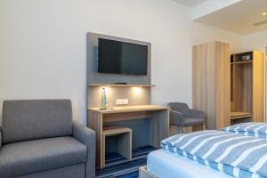 Postel nebo postele na pokoji v ubytování Hotel Lumi