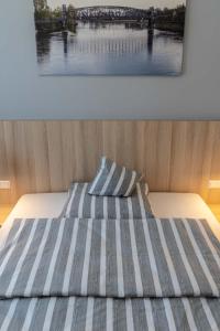 Postel nebo postele na pokoji v ubytování Hotel Lumi