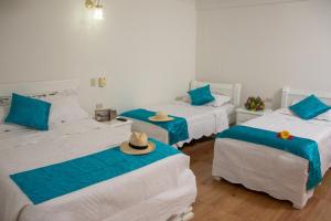 Postel nebo postele na pokoji v ubytování Casa Villa Colonial By Akel Hotels