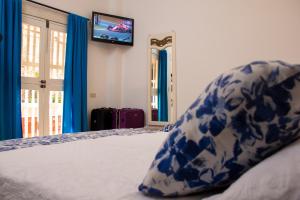 Postel nebo postele na pokoji v ubytování Casa Villa Colonial By Akel Hotels