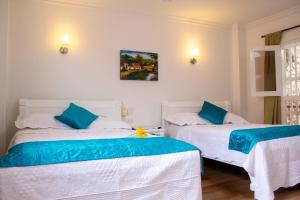 Postel nebo postele na pokoji v ubytování Casa Villa Colonial By Akel Hotels