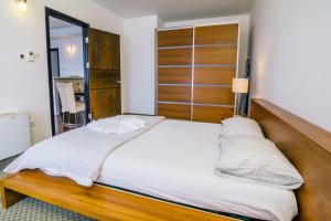 Posteľ alebo postele v izbe v ubytovaní Imperial Suites