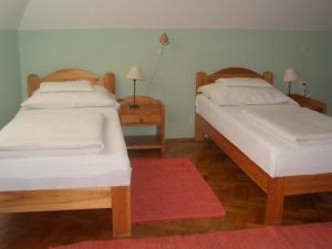 Tempat tidur dalam kamar di Apartments-Mini-Hotel