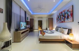 Sunset Paradise Villa客房内的一张或多张床位