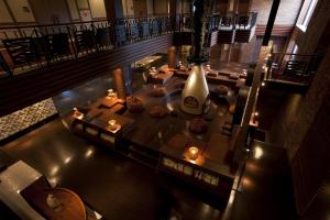 an overhead view of a lobby with a table with candles at Lake Shikotsu Tsuruga Resort Spa Mizu no Uta in Chitose