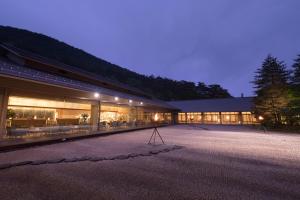 a building with a camera in front of it at night at Kashoen in Hanamaki
