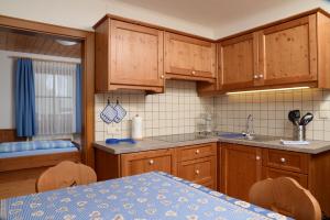 Kuchyň nebo kuchyňský kout v ubytování Appartments Pizach