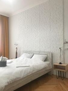 Postel nebo postele na pokoji v ubytování Guest House Story