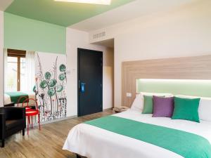 Posteľ alebo postele v izbe v ubytovaní Residenza del Borgo