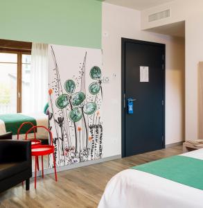 Posteľ alebo postele v izbe v ubytovaní Residenza del Borgo