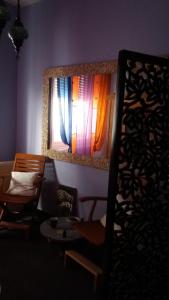 A bed or beds in a room at Il Riposo del Guerriero Guesthouse