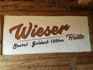Certifikát, ocenenie alebo iný dokument vystavený v ubytovaní Wieser Hütte