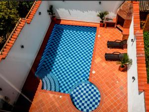 Bazén v ubytování Hotel Casa Suite Curiti nebo v jeho okolí