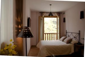Tempat tidur dalam kamar di Estrella de las Nieves