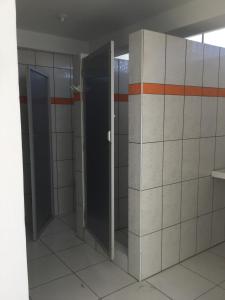 an empty bathroom with two elevators in a building at Antares Paracas in Paracas
