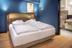 Postel nebo postele na pokoji v ubytování Hotel Rittergut Osthoff