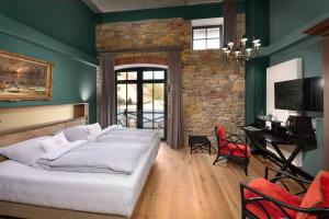 Postel nebo postele na pokoji v ubytování Hotel Rittergut Osthoff + 22 fotografií