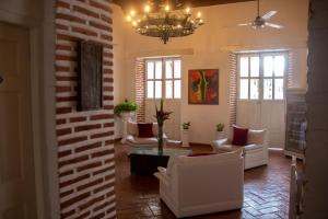 Posezení v ubytování Casa Villa Colonial By Akel Hotels