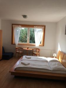 Postel nebo postele na pokoji v ubytování Holiday Park Vrchlabí - Liščí farma + 37 fotografií