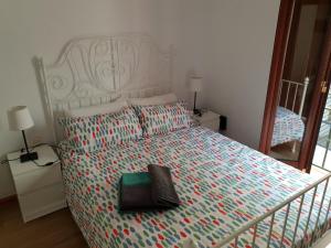 A bed or beds in a room at HISPALIS SAN LUIS