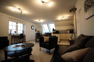 Posezení v ubytování Villa&Loge