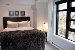 Postel nebo postele na pokoji v ubytování Gibbons Life Accommodations
