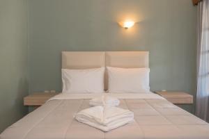 Postel nebo postele na pokoji v ubytování Villa Fos