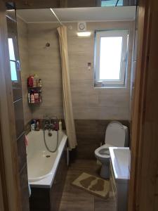 Koupelna v ubytování Котедж Mountain house + 32 fotografií