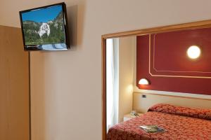 TV a/nebo společenská místnost v ubytování Hotel Boston
