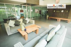 Posezení v ubytování Chiang Mai Old Town luxury Pool Apartment - Kumamoto home + 37 fotografií