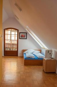 Posteľ alebo postele v izbe v ubytovaní Mikołajki Apartamenty