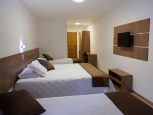 Postel nebo postele na pokoji v ubytování Al Mare Hotel