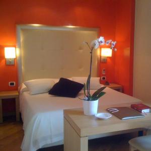 Giường trong phòng chung tại Hotel Europa