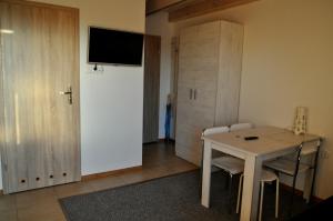 TV a/nebo společenská místnost v ubytování Gościniec Kaszubski Homestay