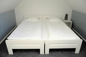 Postel nebo postele na pokoji v ubytování Gościniec Kaszubski Homestay