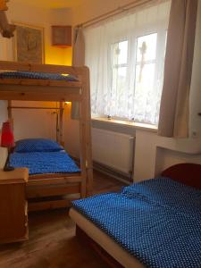 Letto o letti in una camera di Chalupa U Potoka