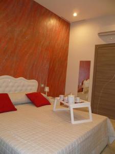 Ένα ή περισσότερα κρεβάτια σε δωμάτιο στο Domus Pompeii