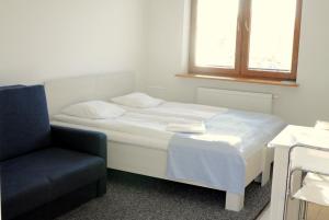 Postel nebo postele na pokoji v ubytování Gościniec Kaszubski Homestay