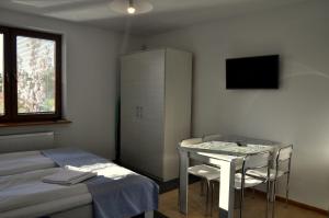 Postel nebo postele na pokoji v ubytování Gościniec Kaszubski Homestay