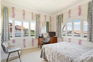 Ein Bett oder Betten in einem Zimmer der Unterkunft Hotel Les Goelands