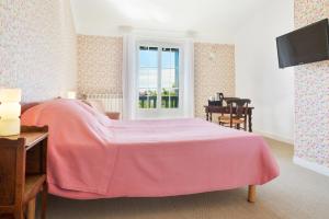 Ein Bett oder Betten in einem Zimmer der Unterkunft Hotel Les Goelands
